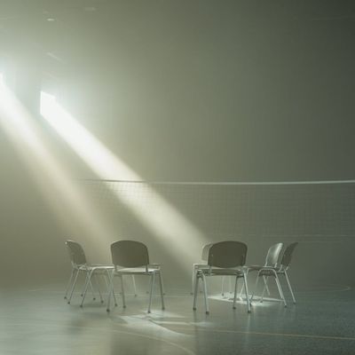 Abstract light beams in a fitness studio hall